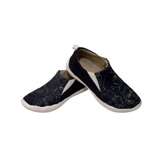 Andose shoes in black with face figures on the front, size 10 women